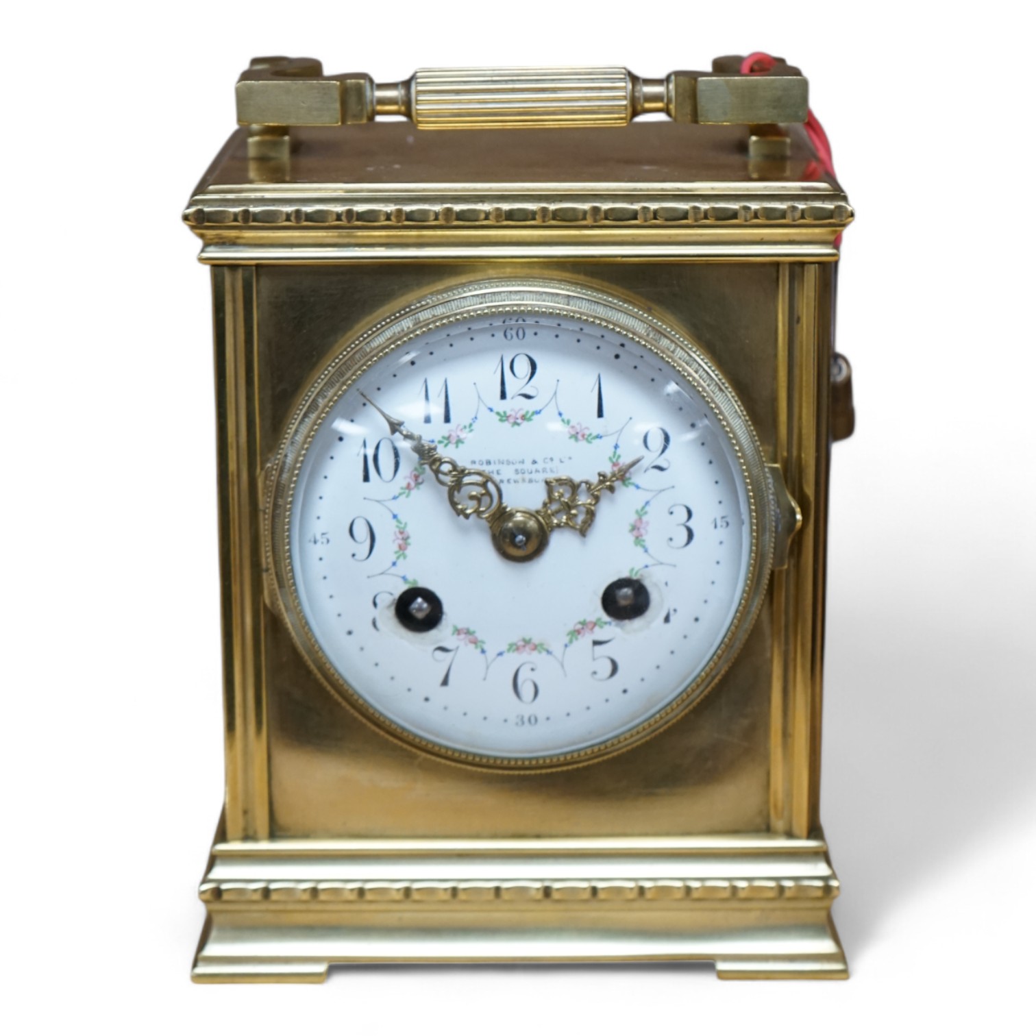 A late 19th century French brass large carriage clock with convex enamel dial, retailed by Robinson & Co. with key, 17cm. Condition - fair to good, not tested as working